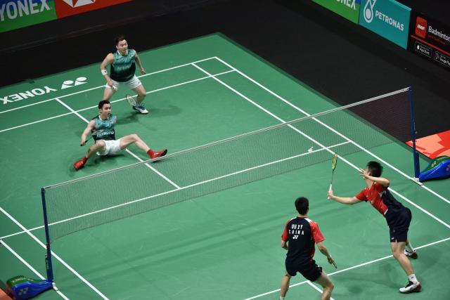 百家乐游戏-男单全军覆没男双齐齐过关 “难兄难弟”冰火两重天